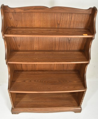Lot 444 - ERCOL - 20TH CENTURY WATERFALL OPEN BOOKCASE