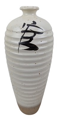 Lot 108 - CHINESE CIZHOU STONEWARE OVOID VASE 磁州白底旋纹瓶