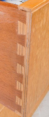 Lot 562 - AUSTINSUITE - MID CENTURY OAK DRESSING TABLE & CHEST OF DRAWERS