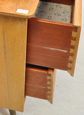 Lot 562 - AUSTINSUITE - MID CENTURY OAK DRESSING TABLE & CHEST OF DRAWERS