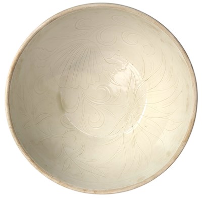 Lot 71 - LARGE DINGYAO LOTUS BOWL 定窑莲花大盌
