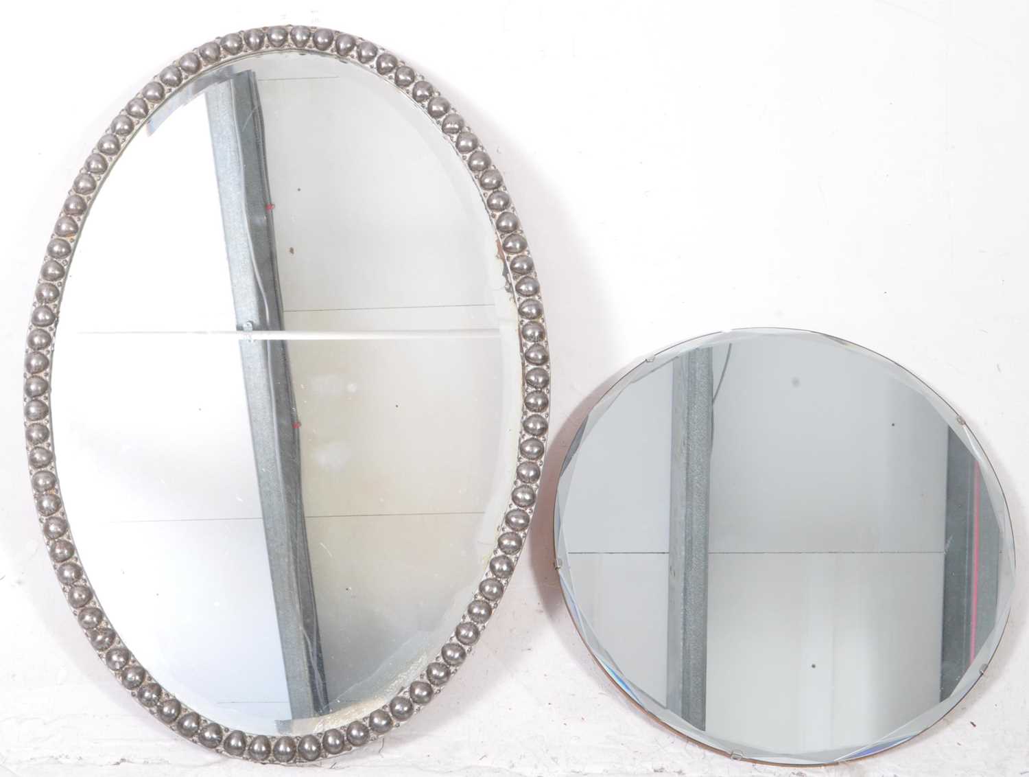 Lot 622 - EARLY 20TH CENTURY PLANISHED OVAL WALL MIRROR