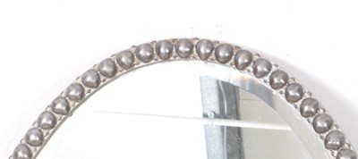 Lot 622 - EARLY 20TH CENTURY PLANISHED OVAL WALL MIRROR