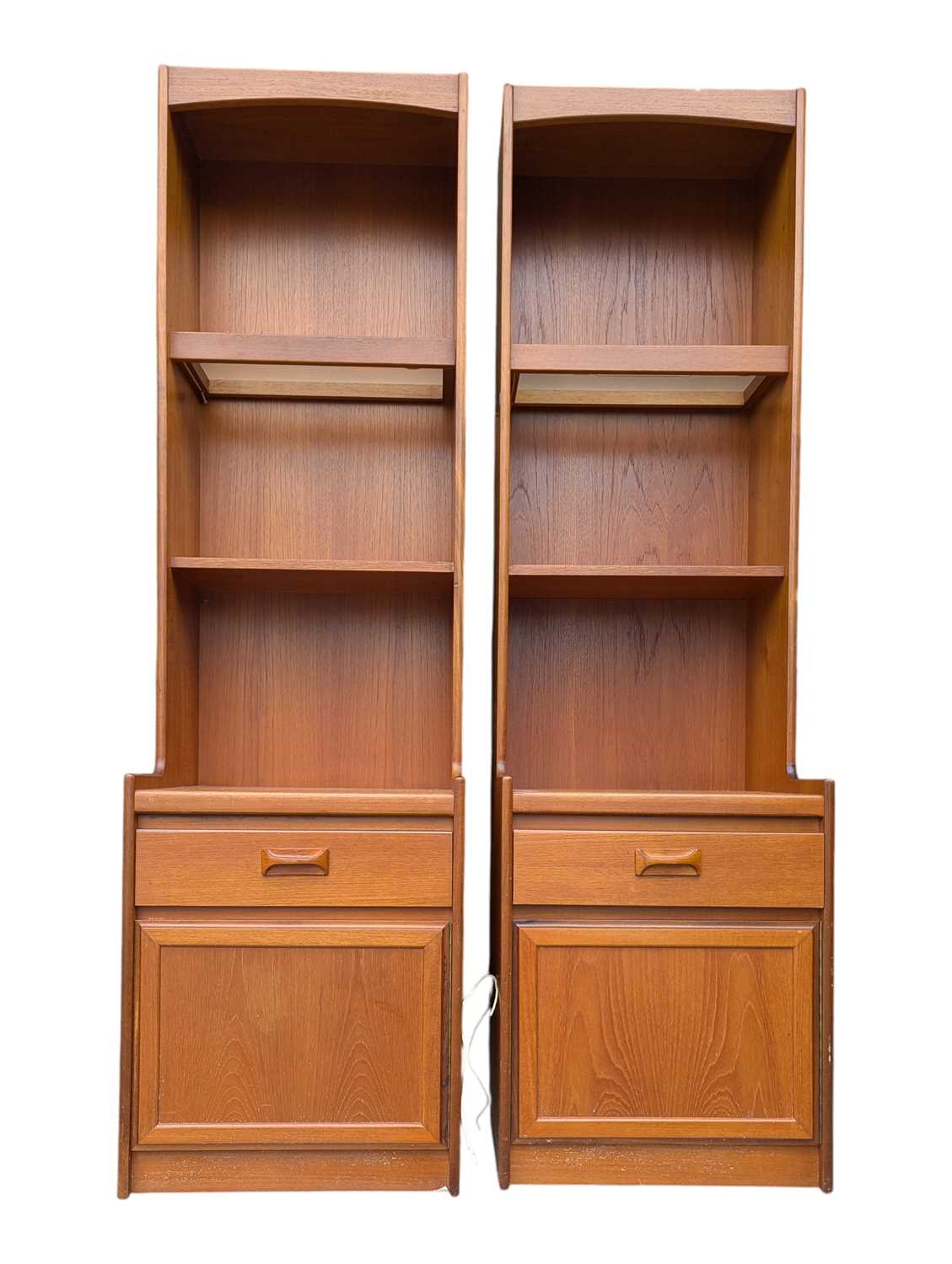 Lot 605 - WILLIAM LAWRENCE FURNITURE - MID CENTURY 1970S UPRIGHT TEAK DISPLAY CABINETS