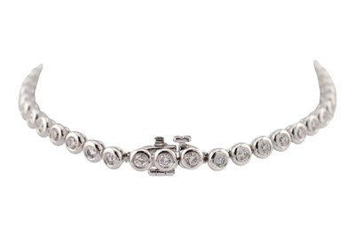 Lot 25 - 18CT WHITE GOLD & DIAMOND LINE BRACELET