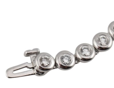 Lot 25 - 18CT WHITE GOLD & DIAMOND LINE BRACELET