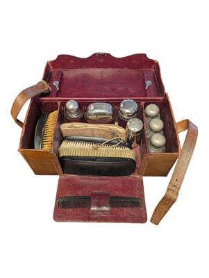 Lot 453 - 20TH CENTURY LEATHER CASED CAMPAIGN TRAVELLING VANITY CASE