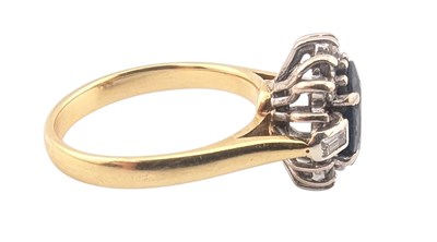 Lot 55 - 18CT GOLD SAPPHIRE & DIAMOND RING