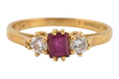 Lot 176 - HALLMARKED 18CT GOLD RUBY & DIAMOND THREE STONE RING