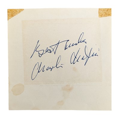 Lot 7 - CHARLIE CHAPLIN - AUTOGRAPH ON AN ALBUM PAGE