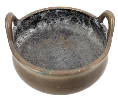 Lot 50 - A CHINESE XUANDE MARK BRONZE TRIPOD INCENSE BURNER CENSER 清 宣德款铜双耳`香炉