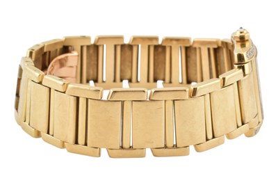 Lot 24 - 18K GOLD & DIAMOND CARTIER TANK FRANCAISE BRACELET WATCH