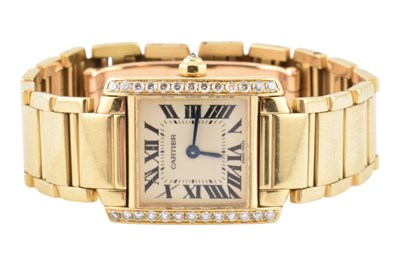 Lot 24 - 18K GOLD & DIAMOND CARTIER TANK FRANCAISE BRACELET WATCH