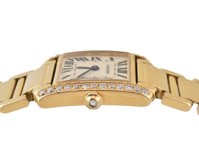 Lot 24 - 18K GOLD & DIAMOND CARTIER TANK FRANCAISE BRACELET WATCH