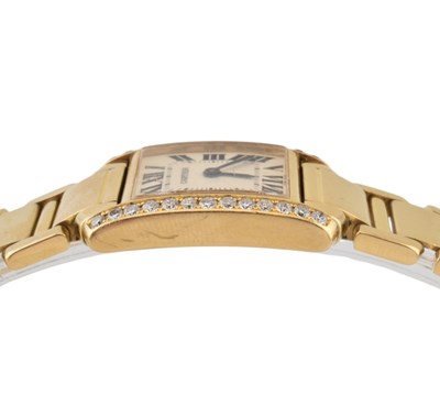 Lot 24 - 18K GOLD & DIAMOND CARTIER TANK FRANCAISE BRACELET WATCH