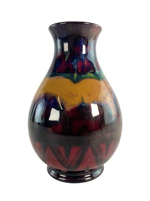 Lot 158 - MOORCROFT - EVENTIDE - EARLY 20TH CENTURY FLAMBE CERAMIC BALUSTER VASE