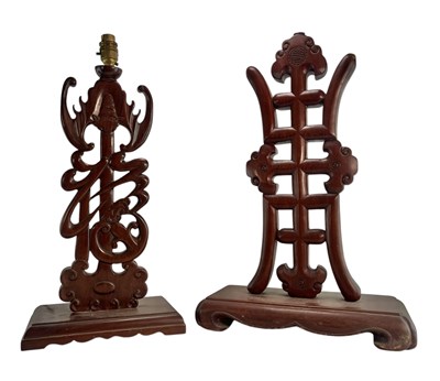 Lot 303 - TWO 20TH CENTURY CHINESE HARDWOOD TABLE LAMPS