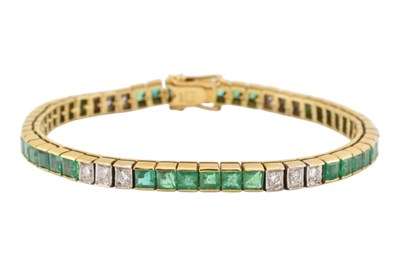 Lot 11 - KOJIS - 18CT GOLD EMERALD & DIAMOND TENNIS BACELET