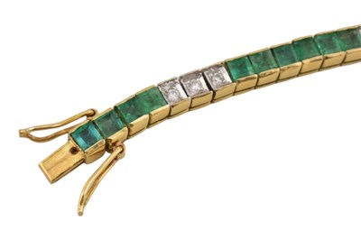 Lot 11 - KOJIS - 18CT GOLD EMERALD & DIAMOND TENNIS BACELET