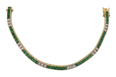 Lot 11 - KOJIS - 18CT GOLD EMERALD & DIAMOND TENNIS BACELET
