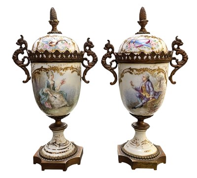 Lot 69 - PAIR OF CONTINENTAL, POSSIBLY FRENCH, 19TH CENTURY PORCELAIN & ORMOLU LIDDED URNS