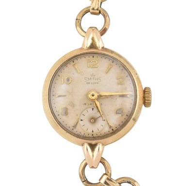 Lot 473 - 9CT GOLD CASED SMITH DELUXE WRISTWATCH ON PLATED BRACELET STRAP