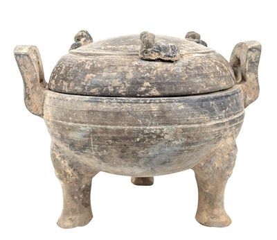 Lot 83 - HAN DYNASTY POTTERY TWIN HANDLED LIDDED TRIPOD DING 汉 陶 三足盖鼎
