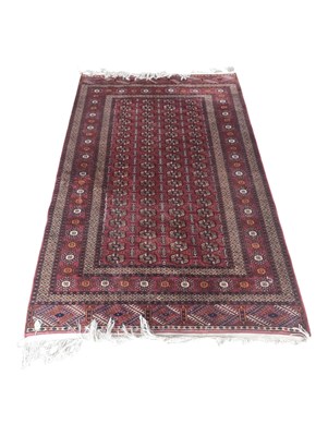Lot 760 - PERSIAN / ISLAMIC 20TH CENTURY BOKHARA FLOOR CARPET RUG