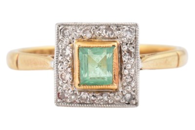 Lot 245 - 18CT GOLD PLATINUM EMERALD & DIAMOND HALO RING