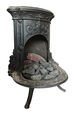 Lot 604 - FRENCH EARLY 20TH CENTURY CAST IRON FOUNTAIN STOVE