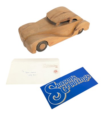 Lot 61 - SANTA CLAUS THE MOVIE (1985) - ORIGINAL PROP WOODEN CAR + CREW CARD