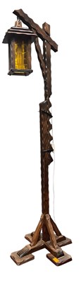 Lot 311 - ARTS & CRAFTS-STYLE CARVED OAK STANDARD LAMP