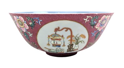 Lot 40 - QING RUBY-GROUND FAMILLE-ROSE SGRAFFIATO 'LANDSCAPE' BOWL 清 道光 粉彩胭脂红地轧道'五谷丰登'图盌