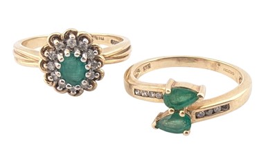 Lot 88 - TWO HALLMARKED EMERALD & DIAMOND RINGS