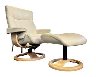Lot 352 - EKORNES - STRESSLESS - RETRO RECLINING SWIVEL ARMCHAIR AND STOOL