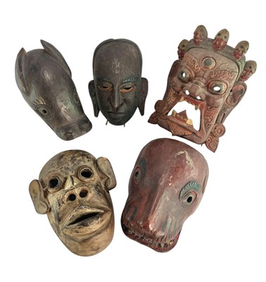 Lot 96 - SELECTION OF FIVE TRIBAL CARVED WOOD WALL MASKS