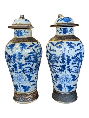 Lot 19 - TWO 19TH CENTURY CHINESE BLUE & WHITE LIDDED JARS