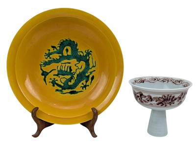Lot 168 - CHINESE YELLOW GROUND DRAGON DISH & AN UNDERGLAZE RED STEM CUP 黄底绿彩盘和釉里红高足杯