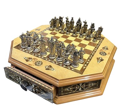 Lot 124 - HELENA WOOD ART HEXAGONAL CHESS BOARD WITH METAL PIECES.