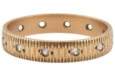 Lot 570 - 1960s HALLMARKED 9CT GOLD GEM SET ETERNITY RING