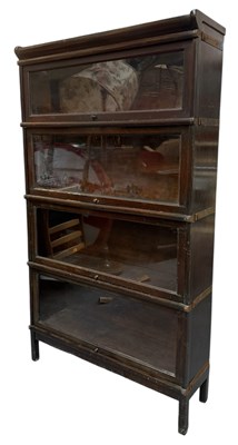 Lot 704 - GLOBE WERNICKE MANNER - OAK LAWYERS' FOUR-TIER STACKING BOOKCASE