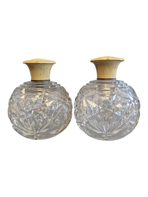 Lot 37 - PAIR OF EARLY 20TH CENTURY PERFUME BOTTLES W/ ENAMEL LIDS