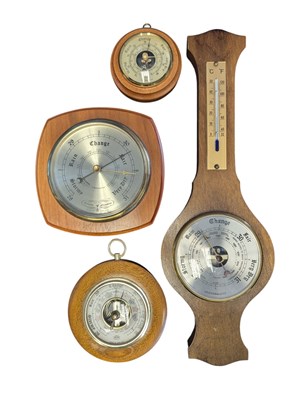Lot 271 - FOUR LATE 20TH CENTURY VINTAGE TEAK WOOD MOUNTED BAROMETERS