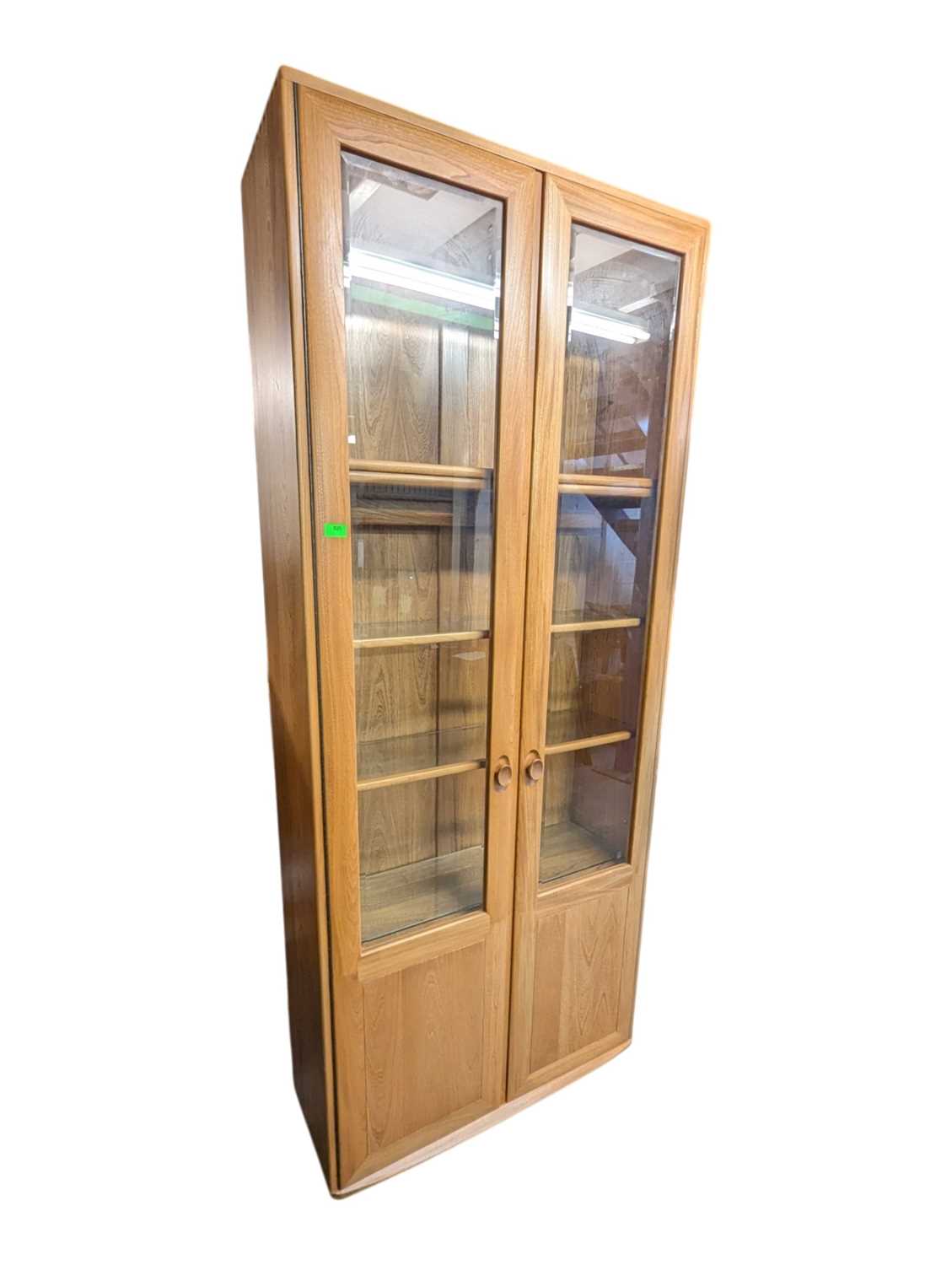 Lot 625 - ERCOL FURNITURE - MODERN WINDSOR RANGE ELM PEDESTAL DISPLAY CABINET