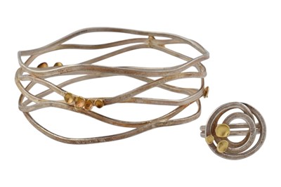 Lot 674 - ARTISANAL SILVER BANGLE & RING