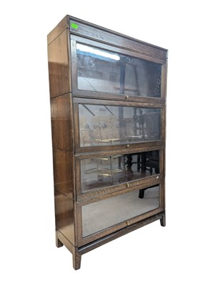 Lot 704 - EARLY 20TH CENTURY OAK LAWYERS / BARRISTERS STACKING BOOKCASE