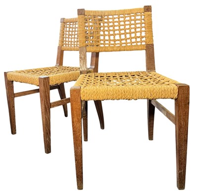 Lot 374 - MANNER OF AUDOUX MINET - PAIR OF RETRO LIMED OAK & SISAL WEAVE CHAIRS