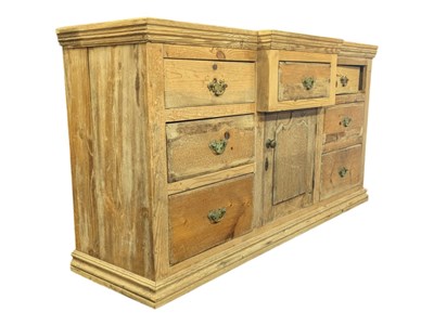 Lot 975 - EARLY 19TH CENTURY GEORGE III PINE BREAKFRONT SIDEBOARD