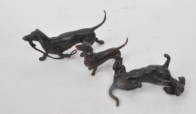 Lot 229 - RICHARD COOPER - THREE CONTEMPORARY BRONZE DOG FIGURES